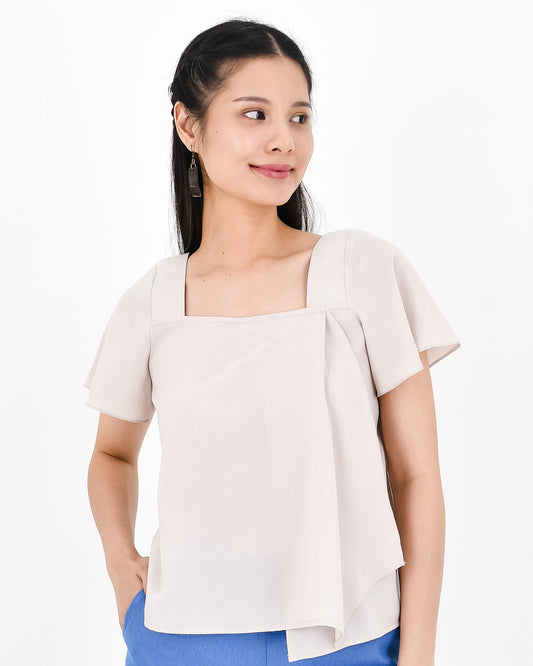UNICA Tops MIA Top