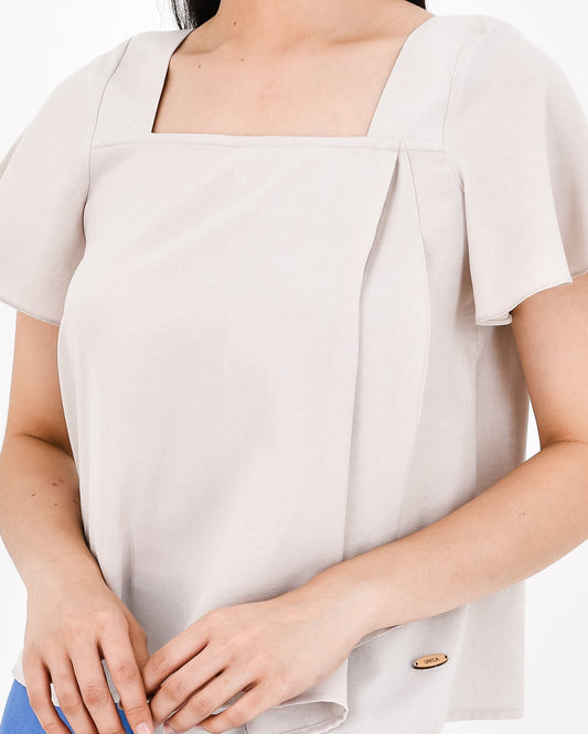 UNICA Tops MIA Top